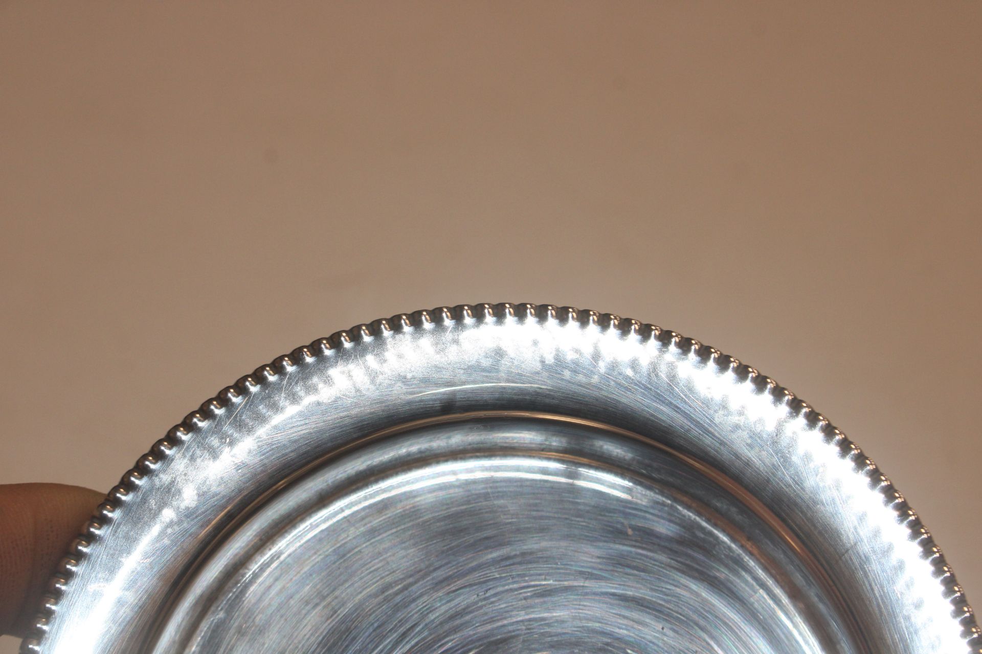 A circular silver dish raised on three supports, a - Image 3 of 6
