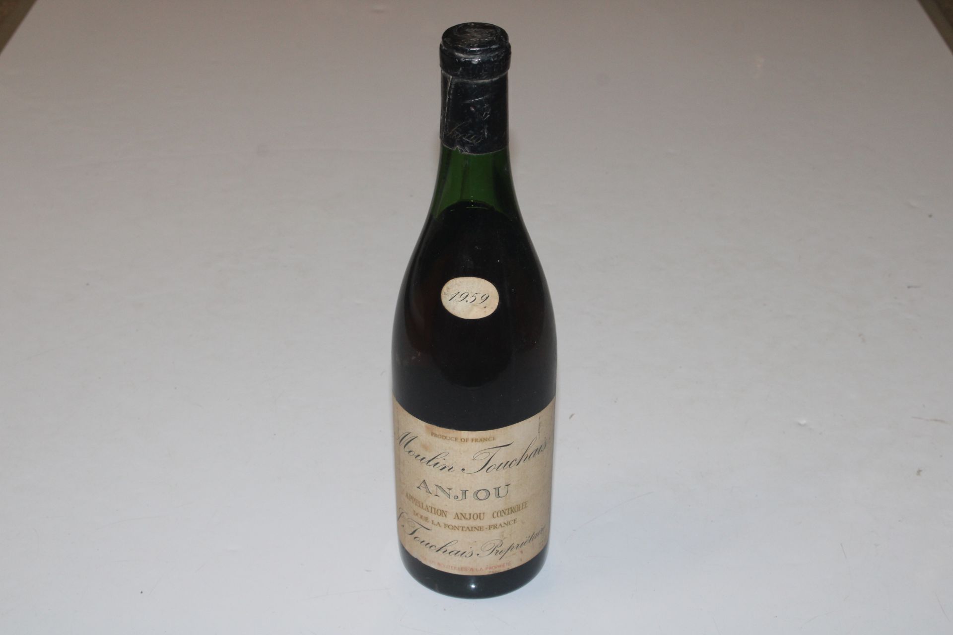 A bottle of Moulin Touchais 1929; and another 1959 - Image 11 of 17