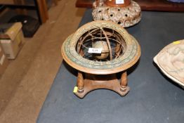 A table top armilliary sphere globe