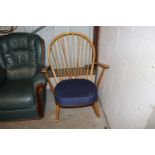 An Ercol stick rocking chair