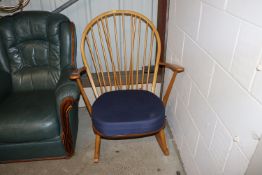 An Ercol stick rocking chair