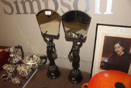 A pair of Art Deco design figural table mirrors wi
