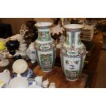 A pair of Canton baluster vases