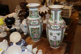 A pair of Canton baluster vases