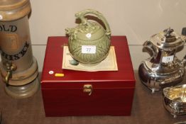 A Chinese celadon glazed Cagodan tea pot with impr