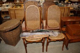 A pair of cane seated and backed bent wood chairs