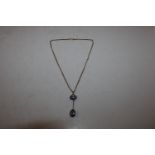 A 9ct gold necklace with amethyst pendant, approx.