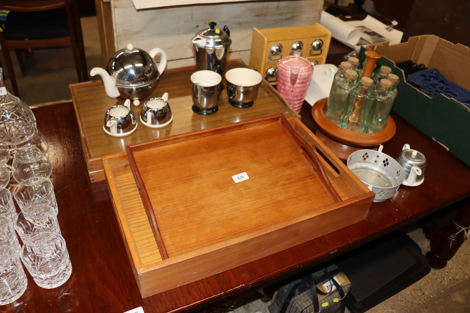 Four trays and a small quantity of teaware; a spic