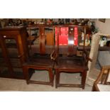 A pair of Chinese elm open armchairs