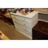 A painted pine chest fitted two short over three l