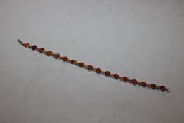 A Sterling silver and amber bracelet approx. 10gms