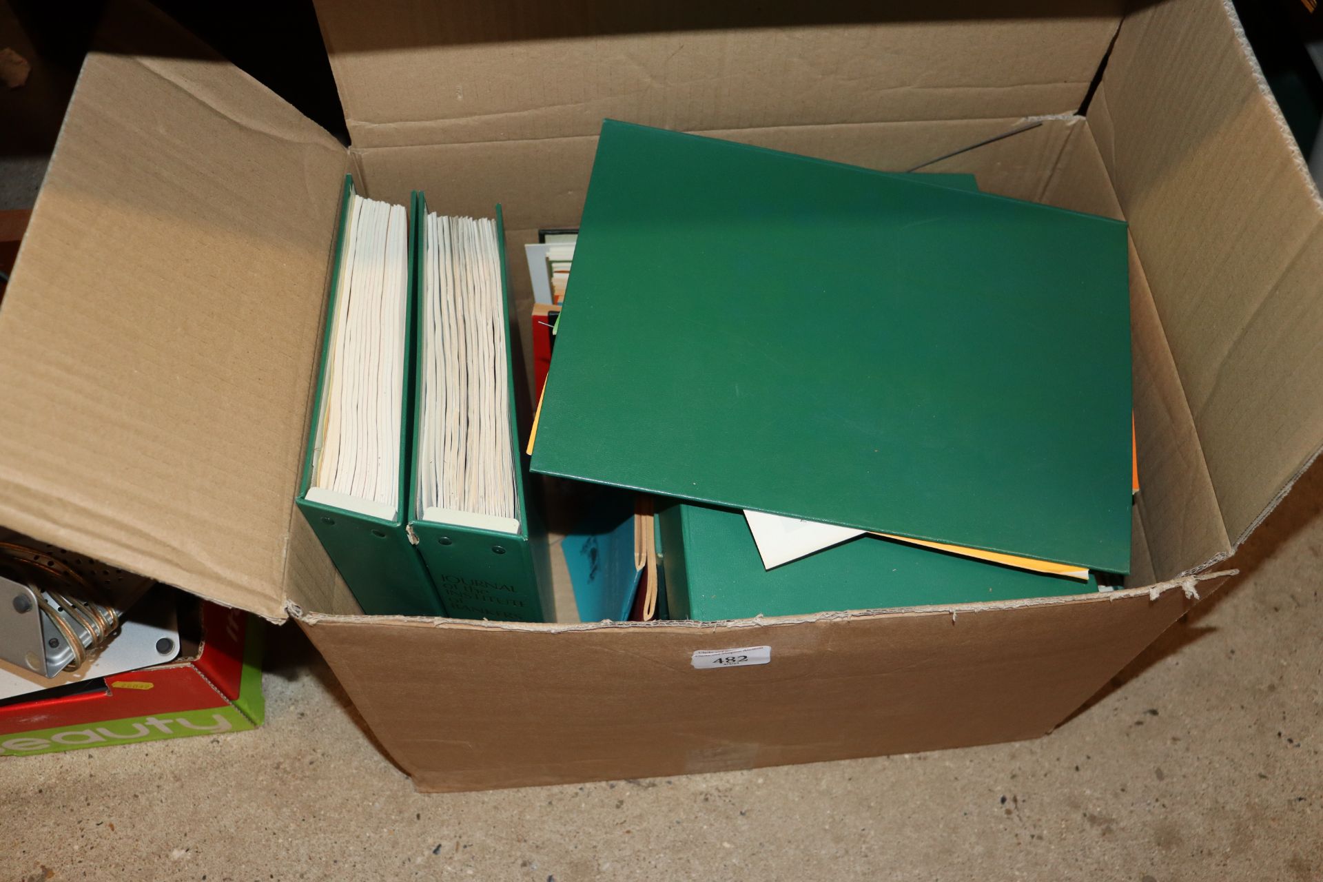 A box containing The Journal of The Institute of B