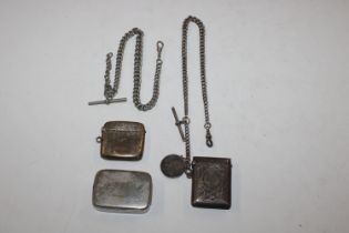 A silver vesta case on chain with T bar; another s