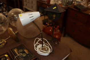 A reading lamp and a table lamp in the form of a s