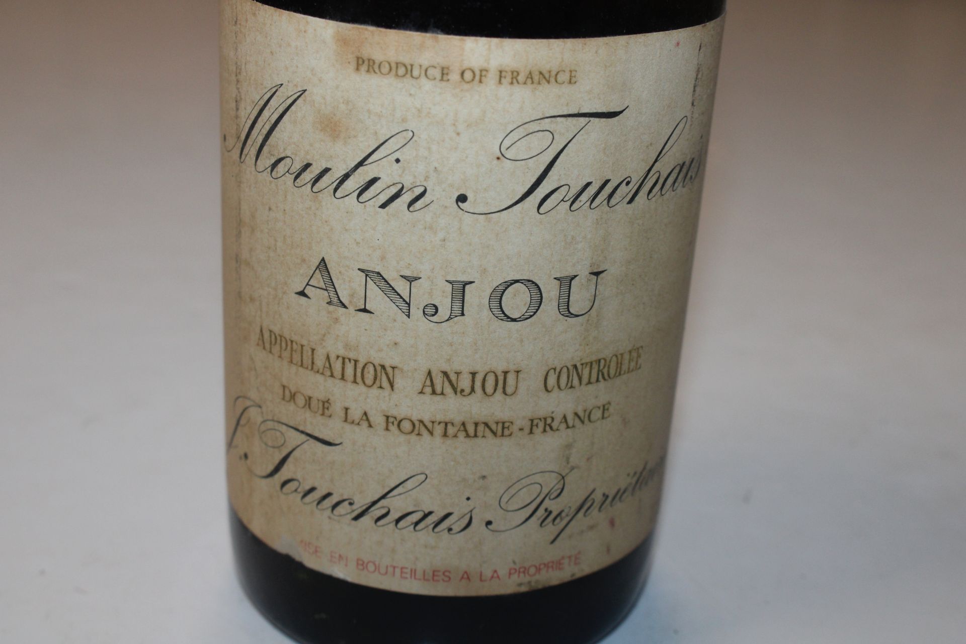 A bottle of Moulin Touchais 1929; and another 1959 - Image 12 of 17