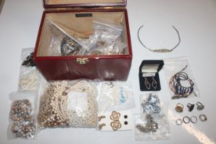 A jewellery box and contents of various costume je