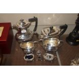 A four piece plated tea set by Walker & Hall; and