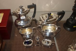 A four piece plated tea set by Walker & Hall; and