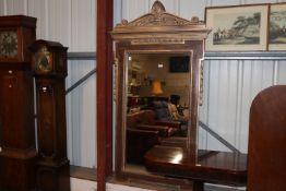 A large decorative gilt framed oblong mirror, meas