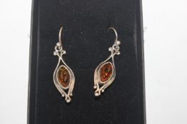 A pair of 925 silver and amber ear-rings