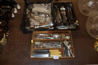 Three trays of various cutlery
