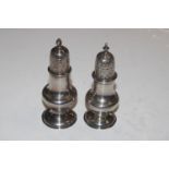 Two silver pepperettes, approx. total weight 135gm