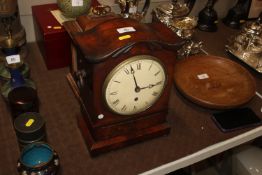 A late Regency carved mahogany and brass inlaid fu