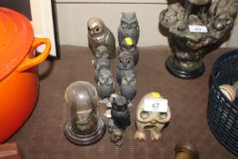 Various owl ornaments including sugar shakers and