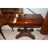 A 19th Century rosewood card table, the fold over