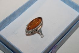 A vintage Sterling silver and amber ring, ring siz