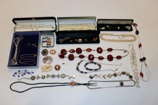 Two boxes of various costume jewellery to include