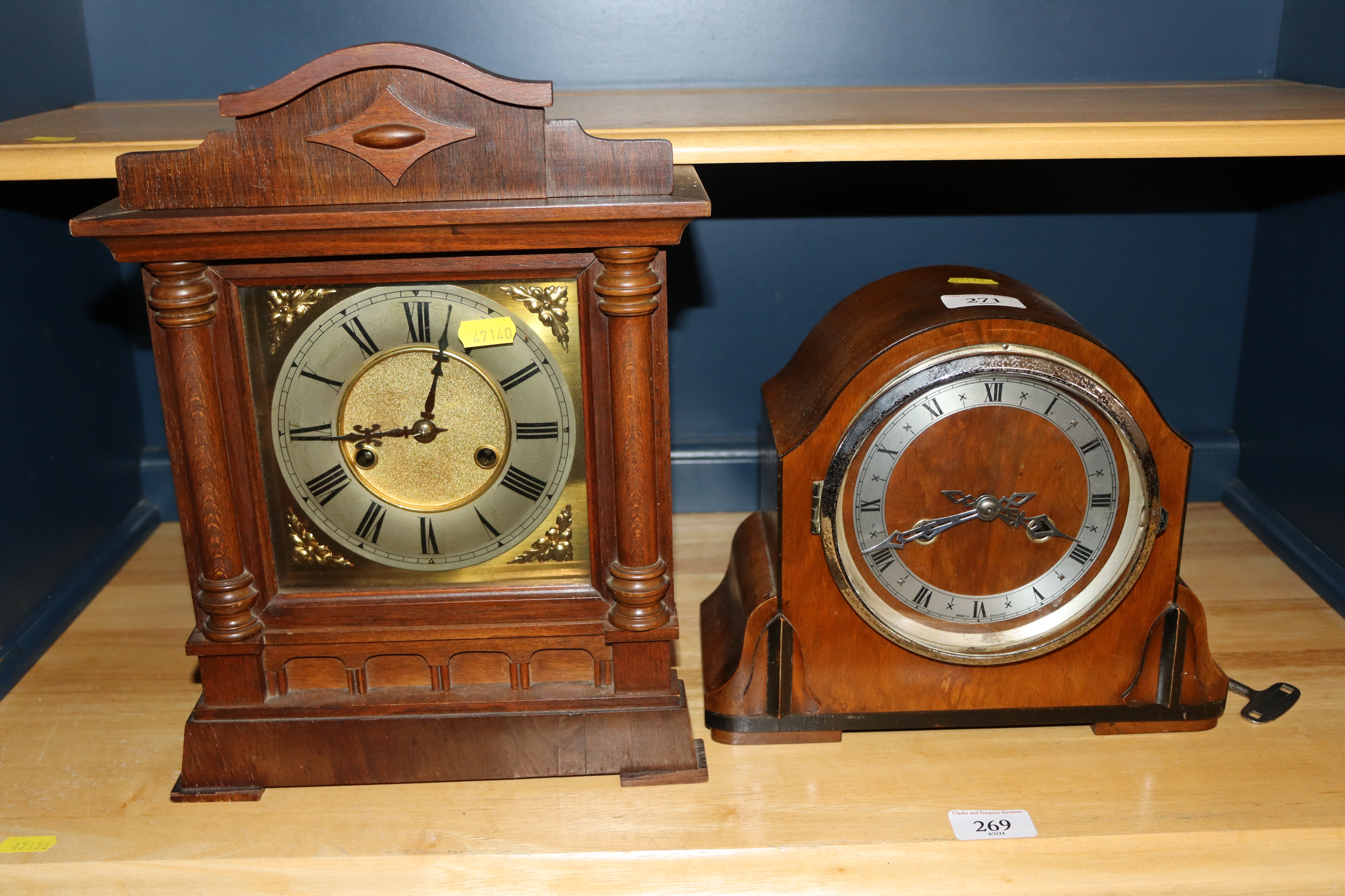 A mahogany cased eight day mantel clock and a Art