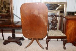 An early 19th Century mahogany tilt top occasional