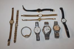 A box of various wrist watches to include Tissot,