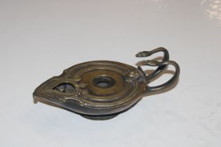 A Regency bronze oil lamp with unusual working pat