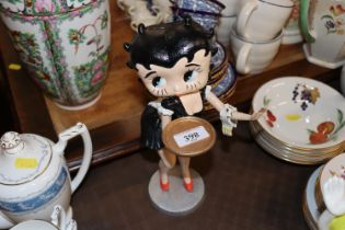 A cast iron model in the form of Betty Boop