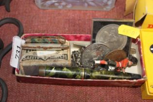 Two vintage fountain pens, a silver bladed mother of pearl handled penknife, commentative coins,