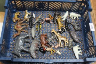 A plastic tray of metal animals