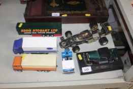 A small collection of diecast vehicles including a