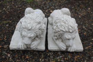 Two cast concrete garden statues in the form of Ch