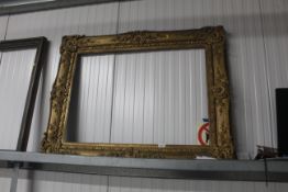An ornate gilt picture frame