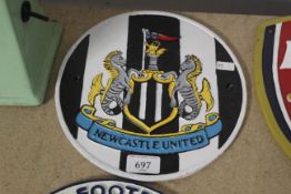A cast iron Newcastle United Football Club plaque