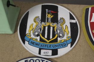 A cast iron Newcastle United Football Club plaque