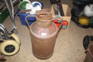 A metal milk churn with twin bar handles and lid