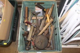 A crate containing various vintage tools to includ