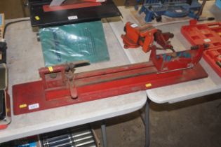 A Black & Decker drill mounting lathe jig