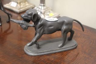 A cast iron figure of a retriever