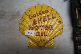 A cast iron Shell Motor oil sign