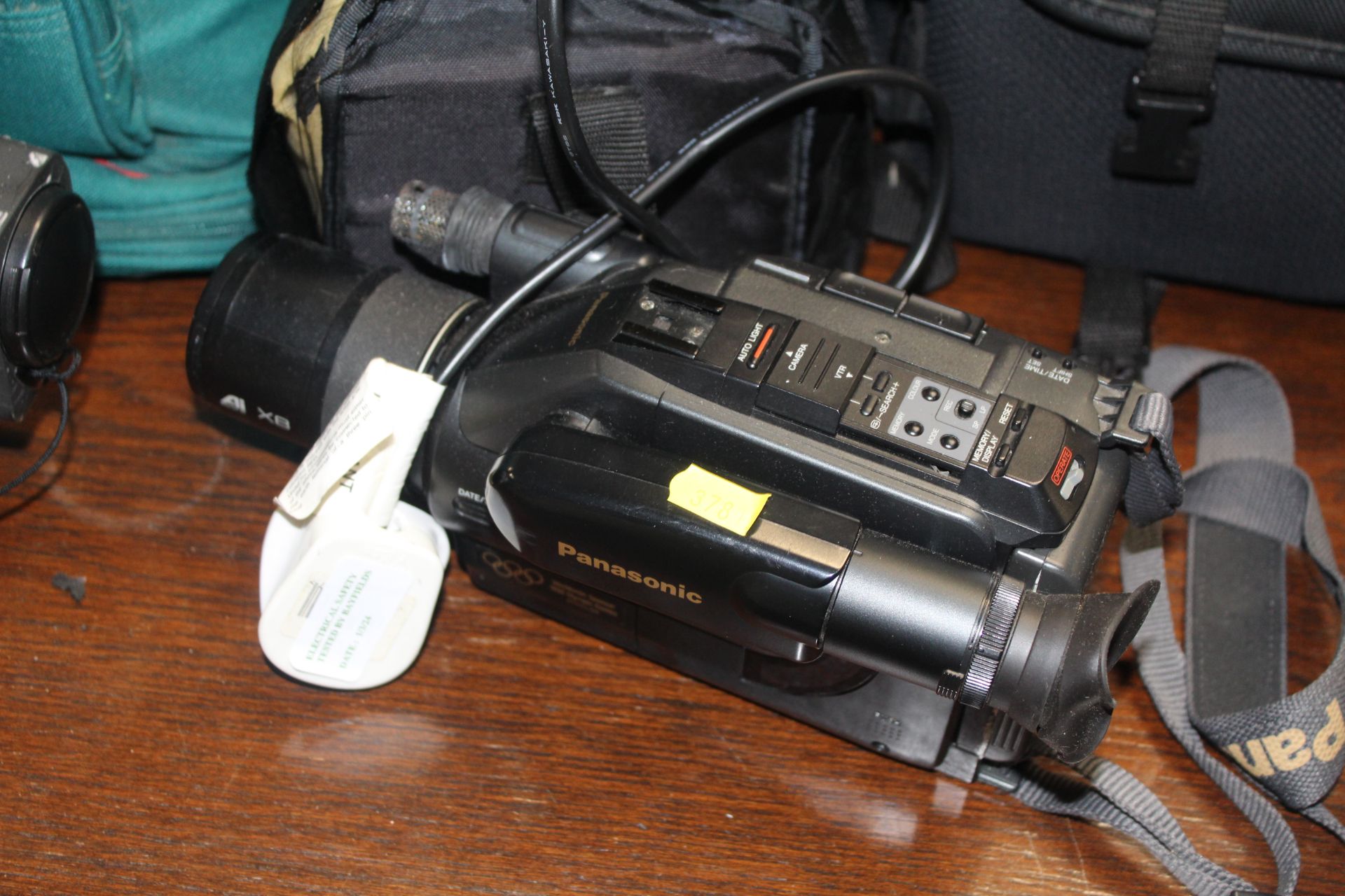 Two Panasonic camcorders and carry bags; and a Fer - Image 3 of 4