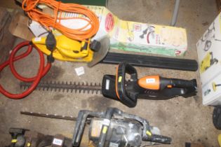 A VonHaus cordless hedge trimmer lacking battery a